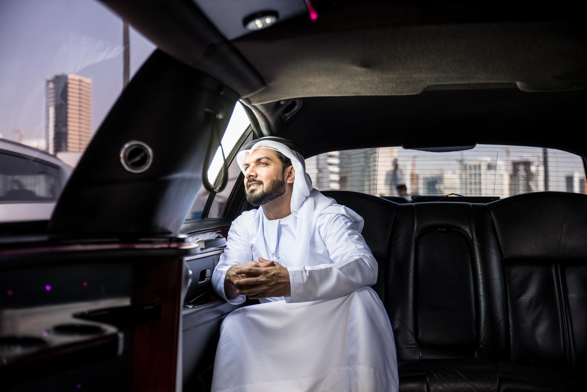 UAE resident in luxury car